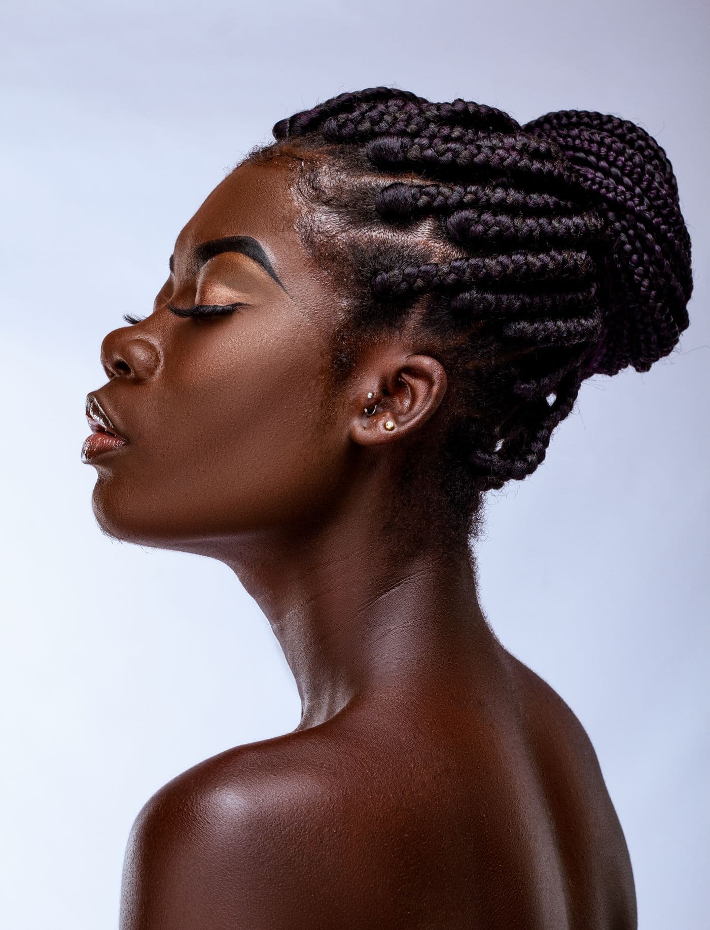 Serene client with an elegant braided updo